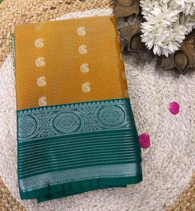 Mustard Gold with Teal Green Temple Border and Silver Zari Buttis saree|Krisa Collection